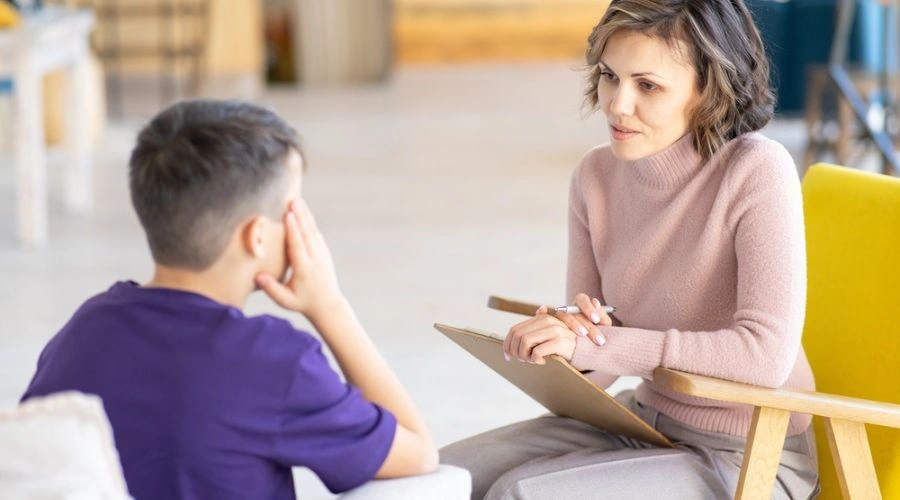 ERP Therapy -Administrator talking to teen with OCD at Artemis Adolescent Healing Center