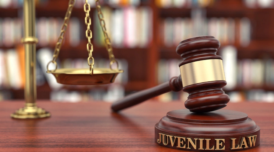Image of a gavel and juvenile law, representing MST’s role in the juvenile justice system