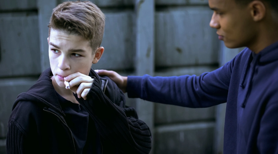 Image of teen using marijuana and highlighting risks of cannabis use