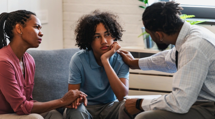 Image of Family participating in a counseling session to support a teen’s substance use recovery