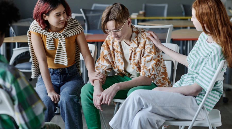 Image of teens practicing decision-making skills by pausing to think through choices during a recovery activity