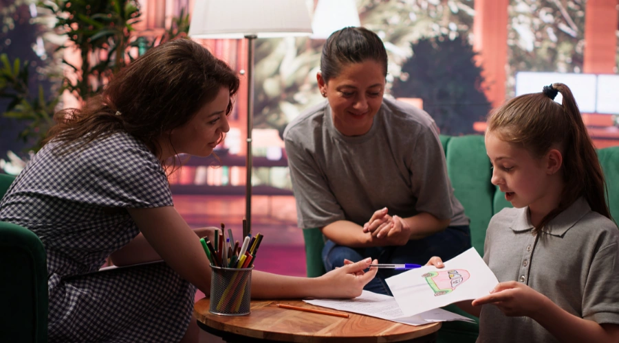 Image of teen creating artwork to express a recovery challenge and possible solutions through art