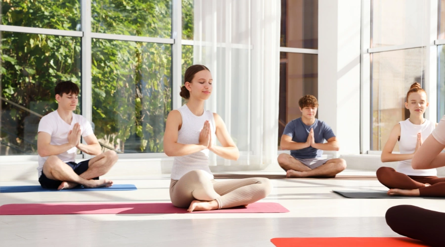 Image of a diverse group of teenagers benefiting from adolescent mindfulness activities
