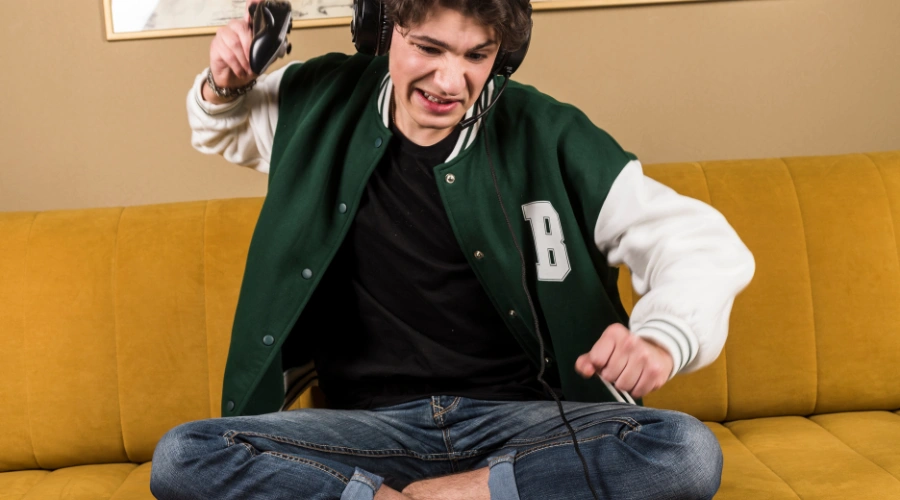 Image of a teenager displaying property destruction as a sign of risky and violent behavior