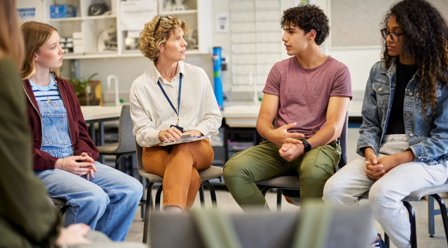 teen talking to therapist outpatient treatment recovery support